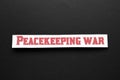 Paper with word Peacekeeping War on black background, top view