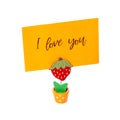 The paper with the words I love you in the note holder is isolated on a white background. Valentine`s day concept