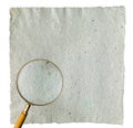 Magnifier on a home made paper isolated Royalty Free Stock Photo