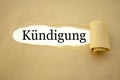 Paper work with the german word for employment termination - kÃÂ¼ndigung Royalty Free Stock Photo