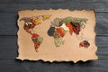 Paper with world map made of different aromatic spices Royalty Free Stock Photo