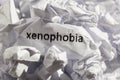 Paper written xenophobia. Concept of old and abandoned idea or p Royalty Free Stock Photo