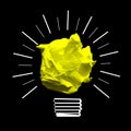 Paperball light bulb on black background - idea, creativity concept Royalty Free Stock Photo