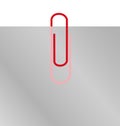 Paperclip on blank paper