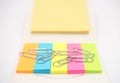Paperclips with colorful notepads. Office and school equipment Royalty Free Stock Photo