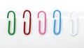 Five colors Paperclips on white background Royalty Free Stock Photo