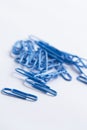 Paperclips on a white surface Royalty Free Stock Photo