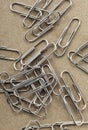 Paperclips on yellow background texture Royalty Free Stock Photo