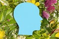 Papercut head with green leaves and flowers. Mental health, emotional wellness, contented emotions, self care, psychology, green Royalty Free Stock Photo