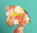 Papercut woman head with spring flowers