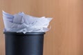 Paperless office as an alternative to overcrowded wastebaskets Royalty Free Stock Photo