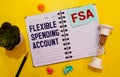 Papers with flexible spending account FSA on a table, business concept. Royalty Free Stock Photo