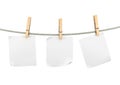 Papers pages on a rope with clothespins Royalty Free Stock Photo