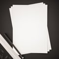 Papers with ruler, pen and clips on black background, 3d rendered Royalty Free Stock Photo