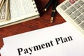 Papers with title payment plan.