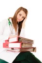 Paperwork. Overworked doctor woman with documents Royalty Free Stock Photo