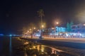 Embankment and tourist walking alley along Mediterranean sea at night