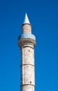 Paphos, Cyprus - Detail of the minaret of the Agia Sophia Paphou mosque against blue sky
