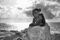 Bronze statue of woman called `Sol Alter` on a stone, Paphos, Cy