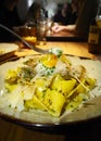 Pappardelle ai Funghi plating with a Poached Egg