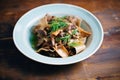 pappardelle with wild mushrooms on an earthenware plate Royalty Free Stock Photo