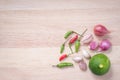 Paprika, garlic, shallot and lemon on cutting board