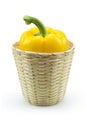 Paprika pepper in bamboo basket isolated white background Royalty Free Stock Photo