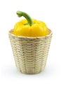 Paprika pepper in bamboo basket isolated white background Royalty Free Stock Photo