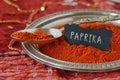Paprika powder on indian carpet Royalty Free Stock Photo