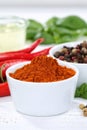 Paprika powder spicy red hot chili peppers chilli portrait format cooking ingredients Royalty Free Stock Photo