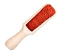 Paprika powder in wooden scoop cutout on white Royalty Free Stock Photo