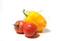 Paprika and tomatoes with water splash Royalty Free Stock Photo