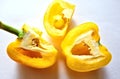 Paprika, yellow pepper in a bowl on white