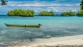 Papua Local Boat, Beautiful Blue Lagoone near Kordiris Homestay, Small Green Island in Background, Gam, West Papuan
