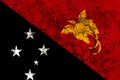 papua new guinea country flag painted on a cracked grungy wall Royalty Free Stock Photo