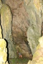 Papuan boy exploring lime stone cave Goa Jepang on Biak Island