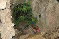 Papuan kids exploring lime stone cave Goa Jepang on Biak Island