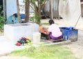 Papuan woman washing clothes Royalty Free Stock Photo