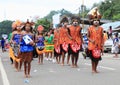 Papuan women in traditional clothes and face paintings