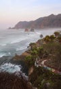 Beautiful morning view before sunrise around Papuma beach in Jember, East Java, Indonesia. Royalty Free Stock Photo