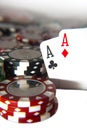 Pair of aces in front of poker chips Royalty Free Stock Photo