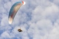 Para glider in fight, hovers in cloudy blue sky Royalty Free Stock Photo