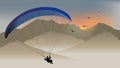 Para-glider hovers over the mountain