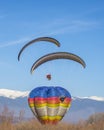 Para gliders with engine flying in the high blue sky