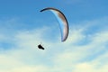 Para gliding above the dunes and coastline