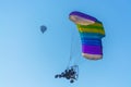 Para motor glider and hot air balloon flaying Royalty Free Stock Photo