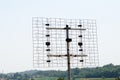 Antenna with parabola, on the roofs that transmits on various frequencies.