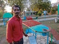 parabolic reflector science project model presenting by Asian chemistry teacher at park in India January 2020