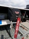 Parachute on the car. A drag race car heading up for top speed in the drag race weekend