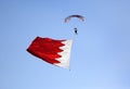 Parachute display team performs before cricket festival at Isa Town, Bahr Royalty Free Stock Photo